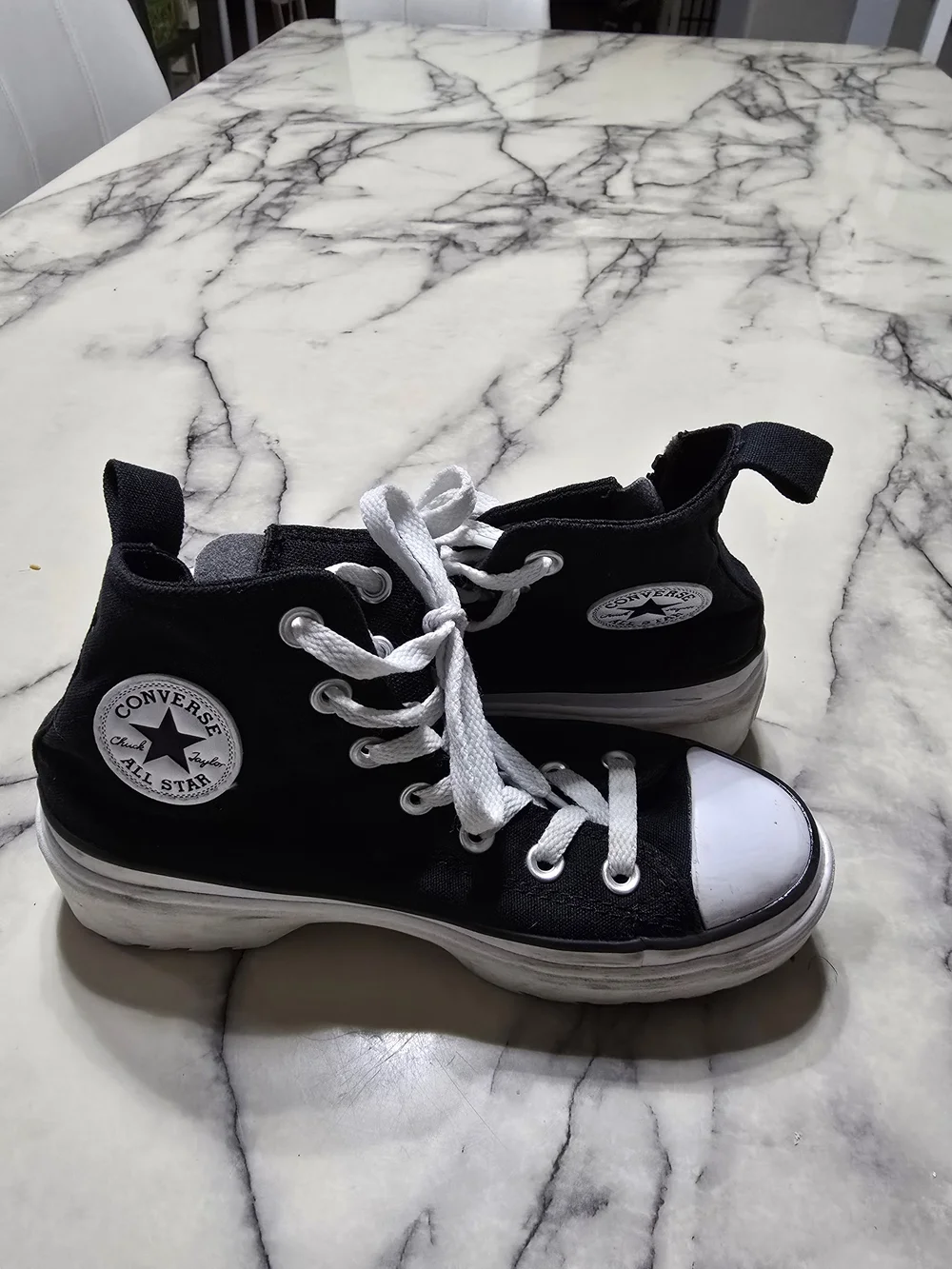 Converse Black and White High-Top Sneakers